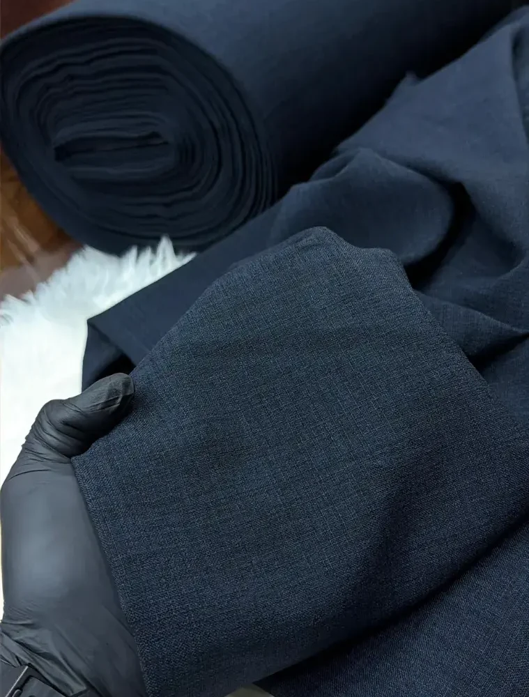 Blue Grey Stock Wool Suiting fabric on the roll